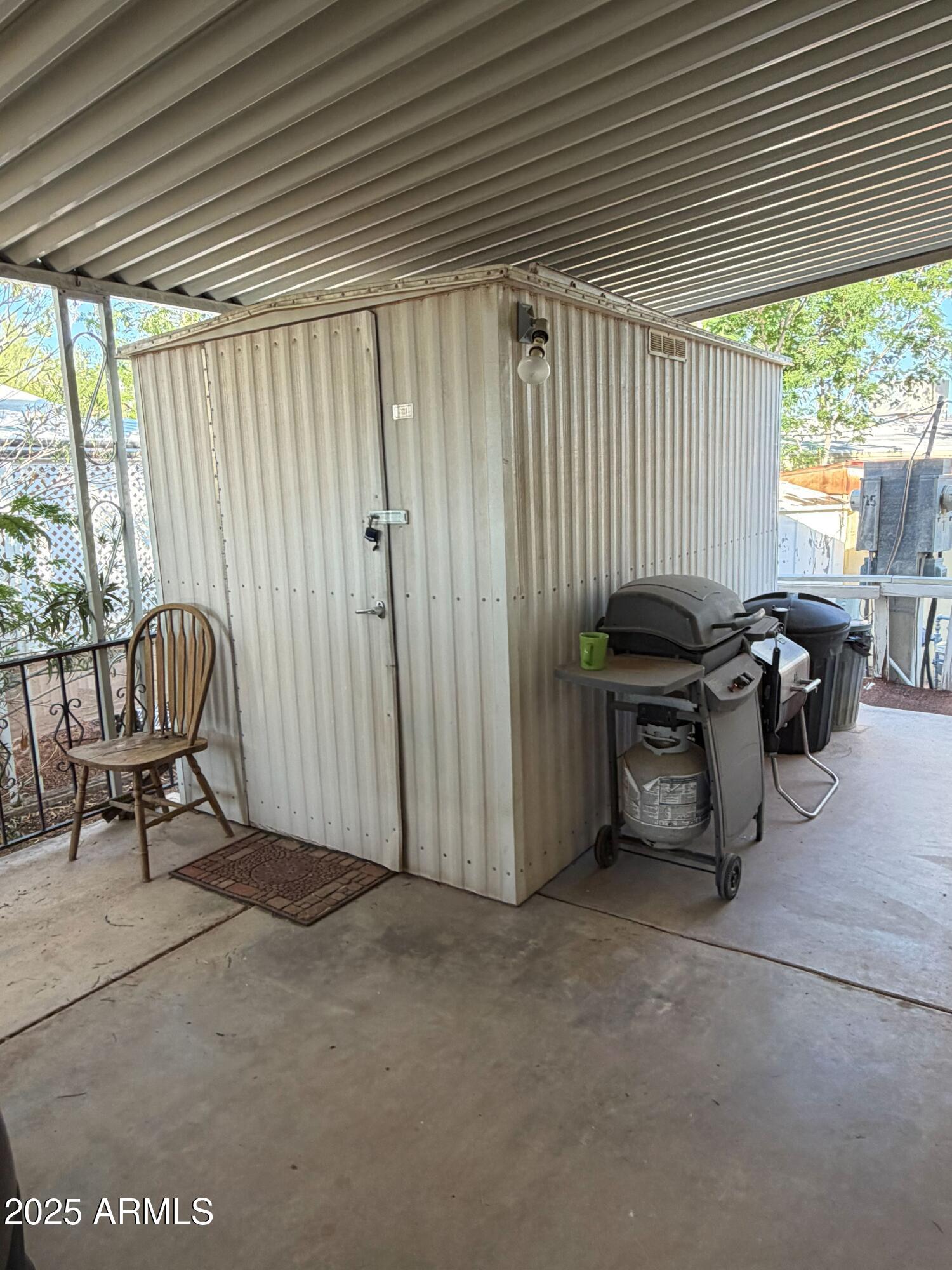 939 North Acacia Road, Unit 25 Apache Junction, AZ 85119 - Photo 22 of 25 an outdoor space with patio