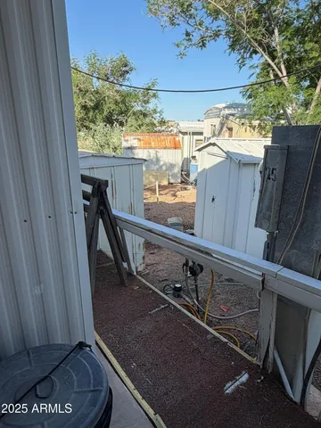 a view of a street with a building in the background