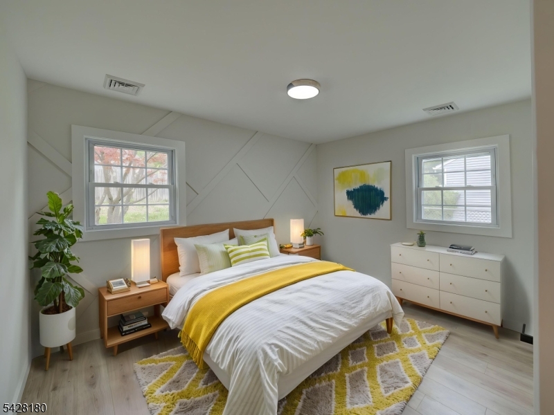 13 Fillmore Street Washington, NJ 07882 - Photo 11 of 21 a bedroom with a bed and windows