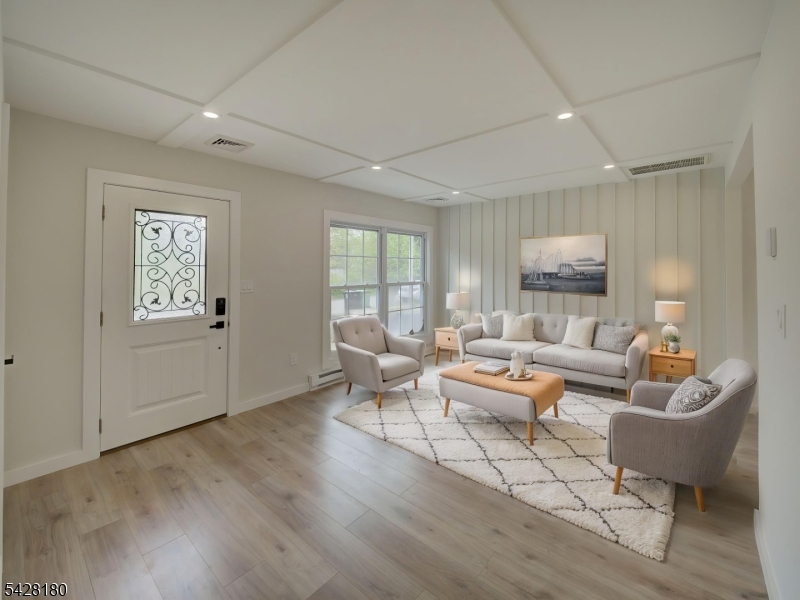 13 Fillmore Street Washington, NJ 07882 - Photo 3 of 21 a living room with furniture and a large window