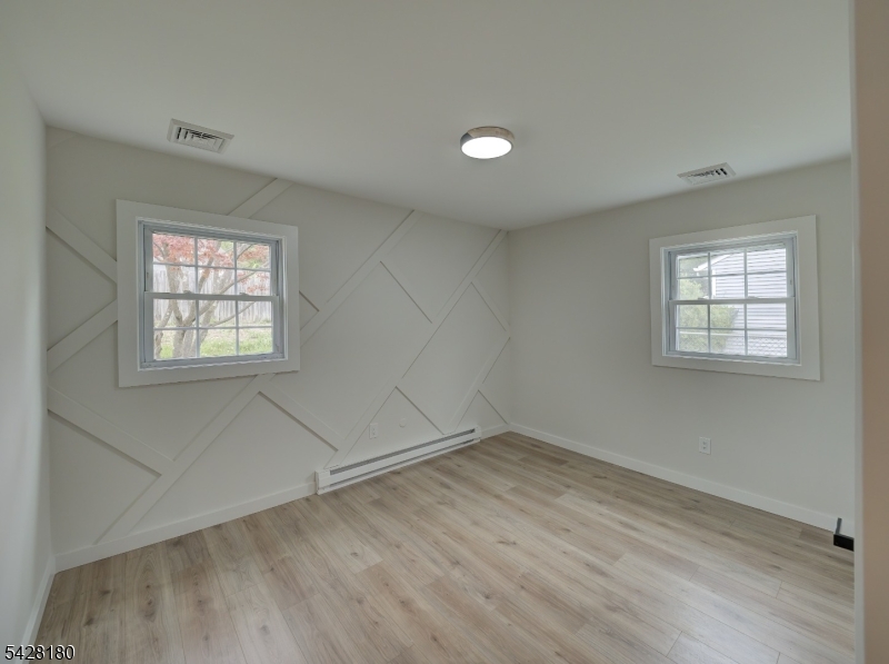 13 Fillmore Street Washington, NJ 07882 - Photo 10 of 21 an empty room with windows