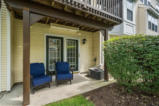 a bench sitting in front of a house