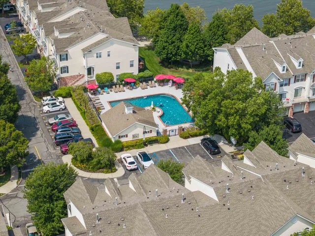 an aerial view of house with yard