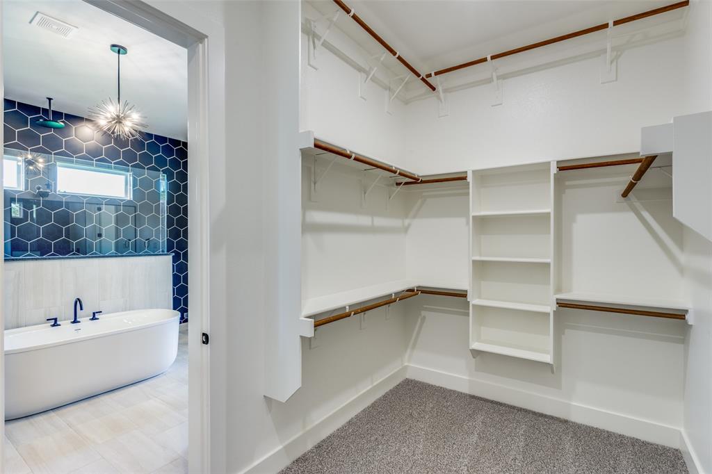 505 Aermotor Loop Weatherford, TX 76085 - Photo 14 of 17 a bathroom with a bathtub and a shower