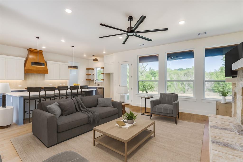 505 Aermotor Loop Weatherford, TX 76085 - Photo 17 of 17 a living room with furniture and a large window