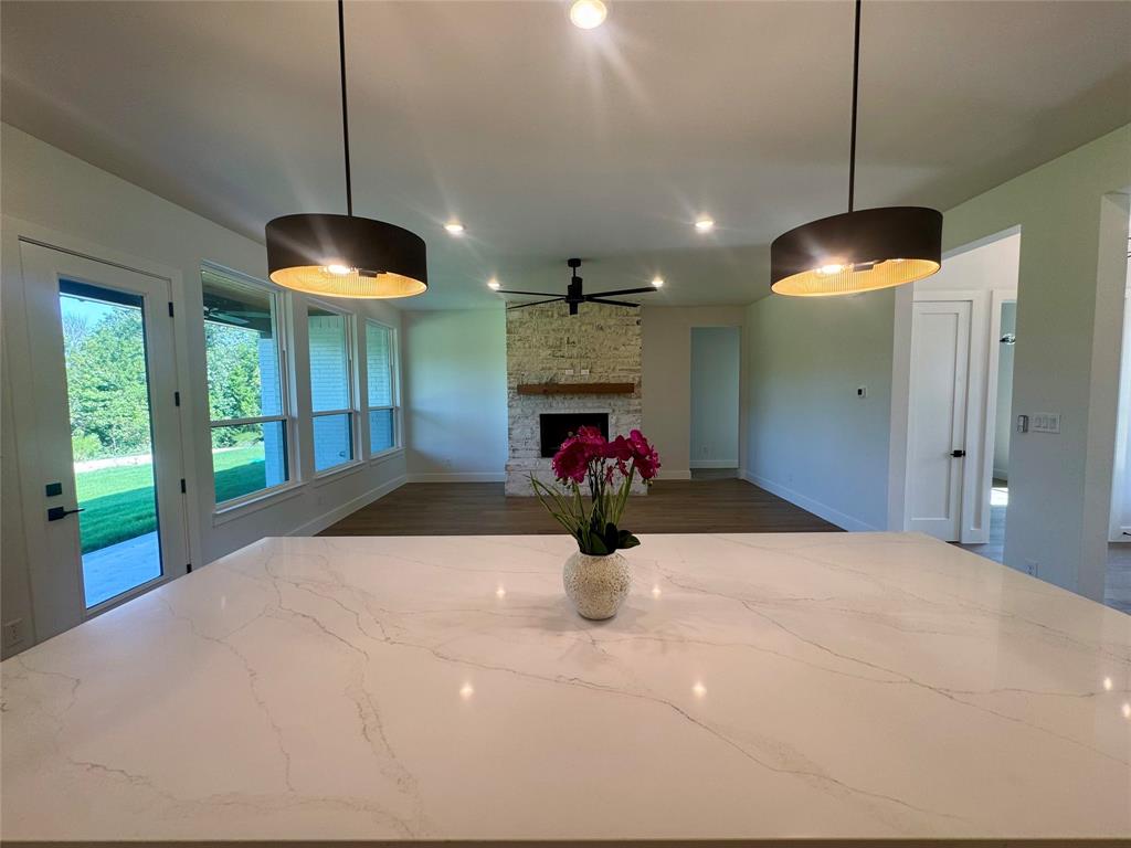505 Aermotor Loop Weatherford, TX 76085 - Photo 8 of 17 a view of a room with a chandelier