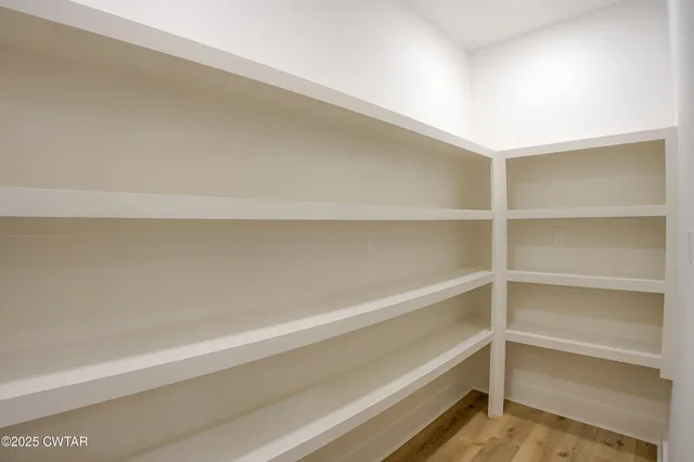 a spacious bathroom with a shower