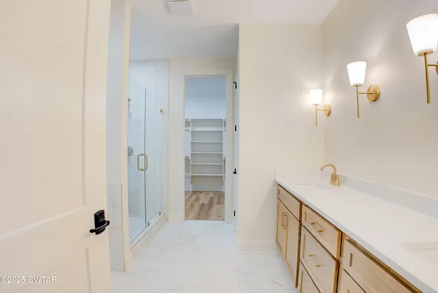 a view of an empty walk in closet