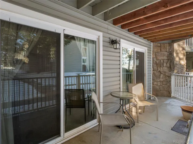 a view of a porch with furniture