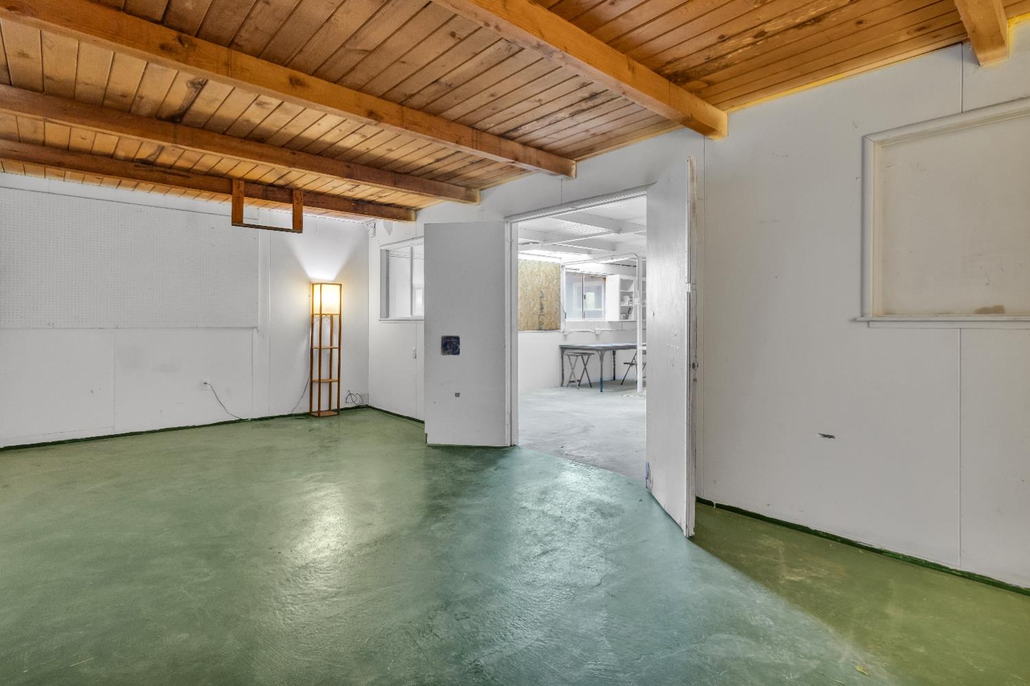 2500 Ethan Way Sacramento, CA 95821 - Photo 24 of 28 a view of a livingroom with wooden floor and a bathroom