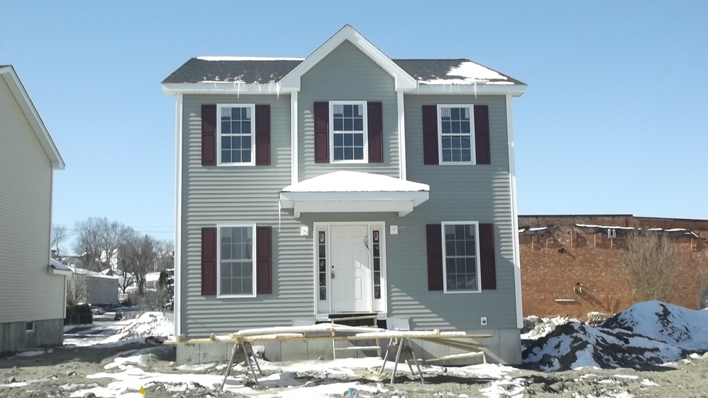 25 Lewiston Street Fall River, MA 02721 - Photo 1 of 1 a front view of a house with a yard