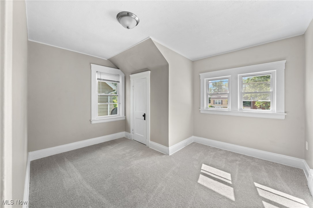 2195 Barrington Road Cleveland, OH 44118 - Photo 30 of 50 Additional living space with vaulted ceiling and light colored carpet