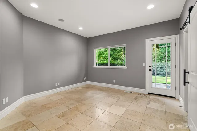 an empty room with windows