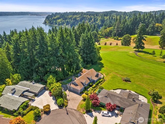 an aerial view of a house with a garden