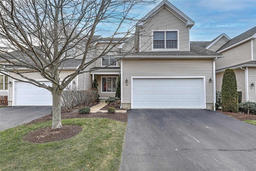 Front exterior with 2 car garage