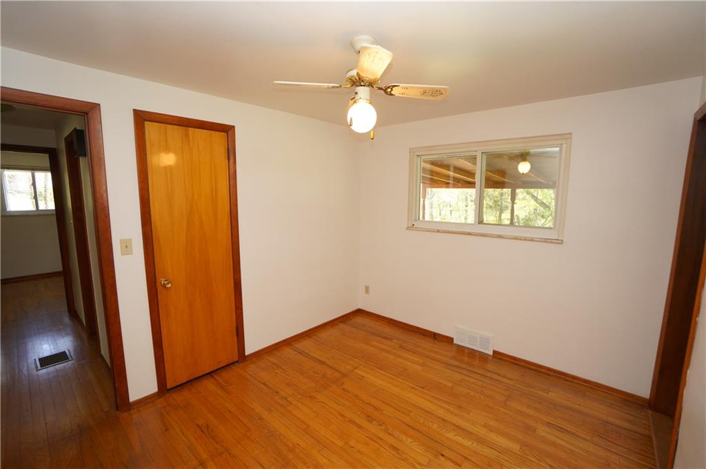 284 Mansfield Road Washington, PA 15301 - Photo 15 of 25 This third bedroom has two entrances; one from hallway and a second one from door by kitchen/back door/basement stairway (on right side of photo)