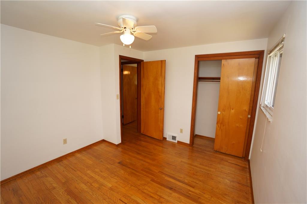 284 Mansfield Road Washington, PA 15301 - Photo 19 of 25 this is the opposite room view of the second bedroom, showing the 6' closet, one window and ceiling fan