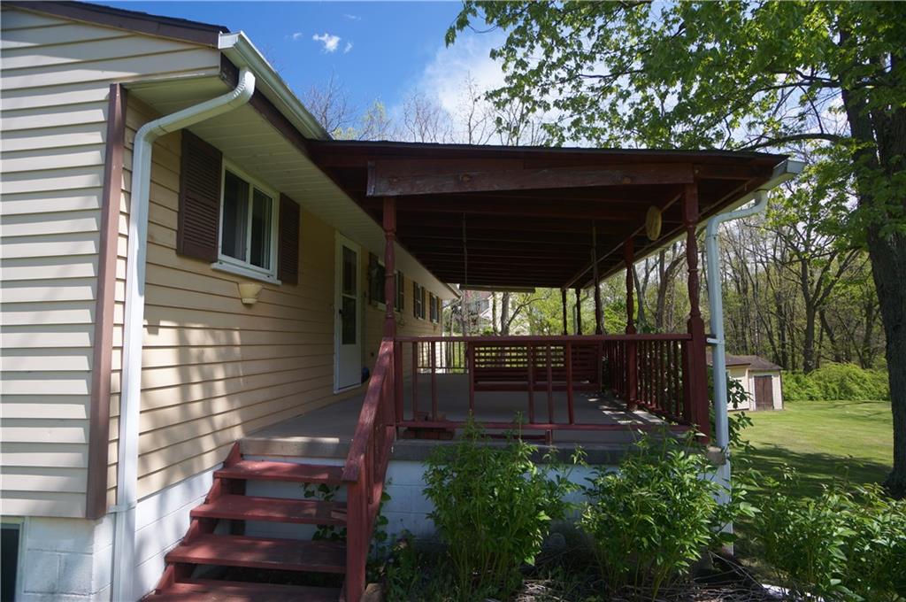 284 Mansfield Road Washington, PA 15301 - Photo 6 of 25 Inviting rear porch w/access to the yard just outside the kitchen door. Oversized one car garage underneath.