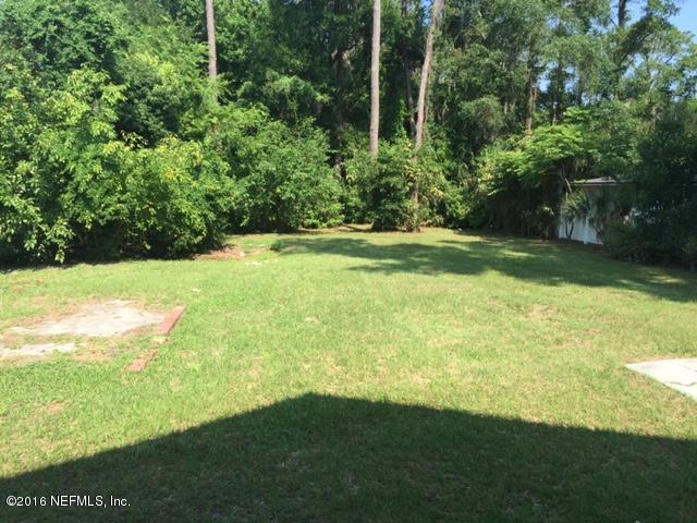3308 St Augustine Road Jacksonville, FL 32207 - Photo 15 of 21 a view of an outdoor space and a yard