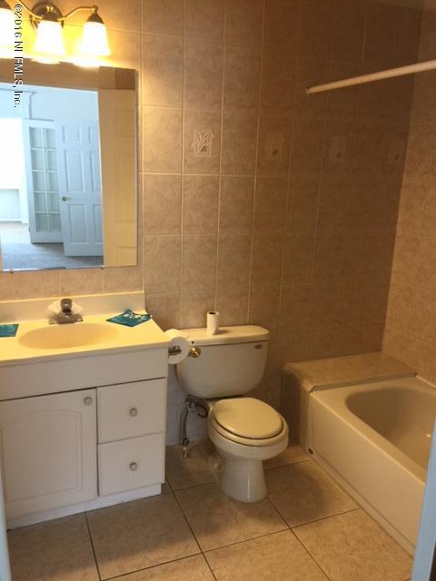 3308 St Augustine Road Jacksonville, FL 32207 - Photo 6 of 21 a bathroom with a sink and a toilet