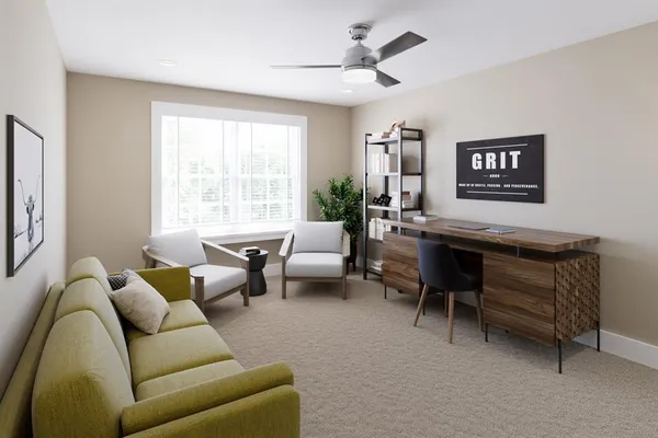 a living room with furniture and a window