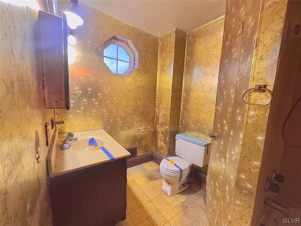 2052 West Broad Street Bethlehem, PA 18018 - Photo 18 of 23 a bathroom with a sink toilet and shower