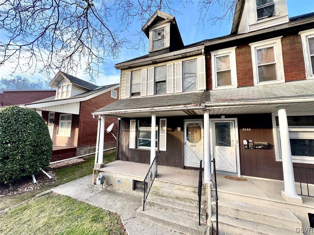 2052 West Broad Street Bethlehem, PA 18018 - Photo 2 of 23 a front view of a house with garden