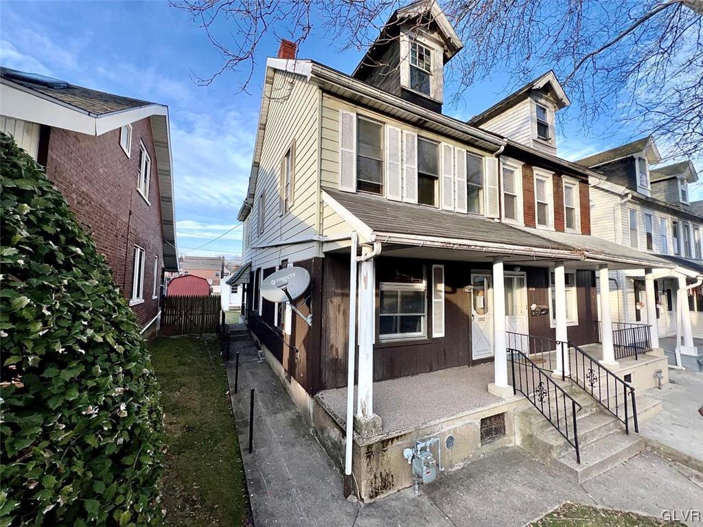 2052 West Broad Street Bethlehem, PA 18018 - Photo 3 of 23 a front view of a house with a garage