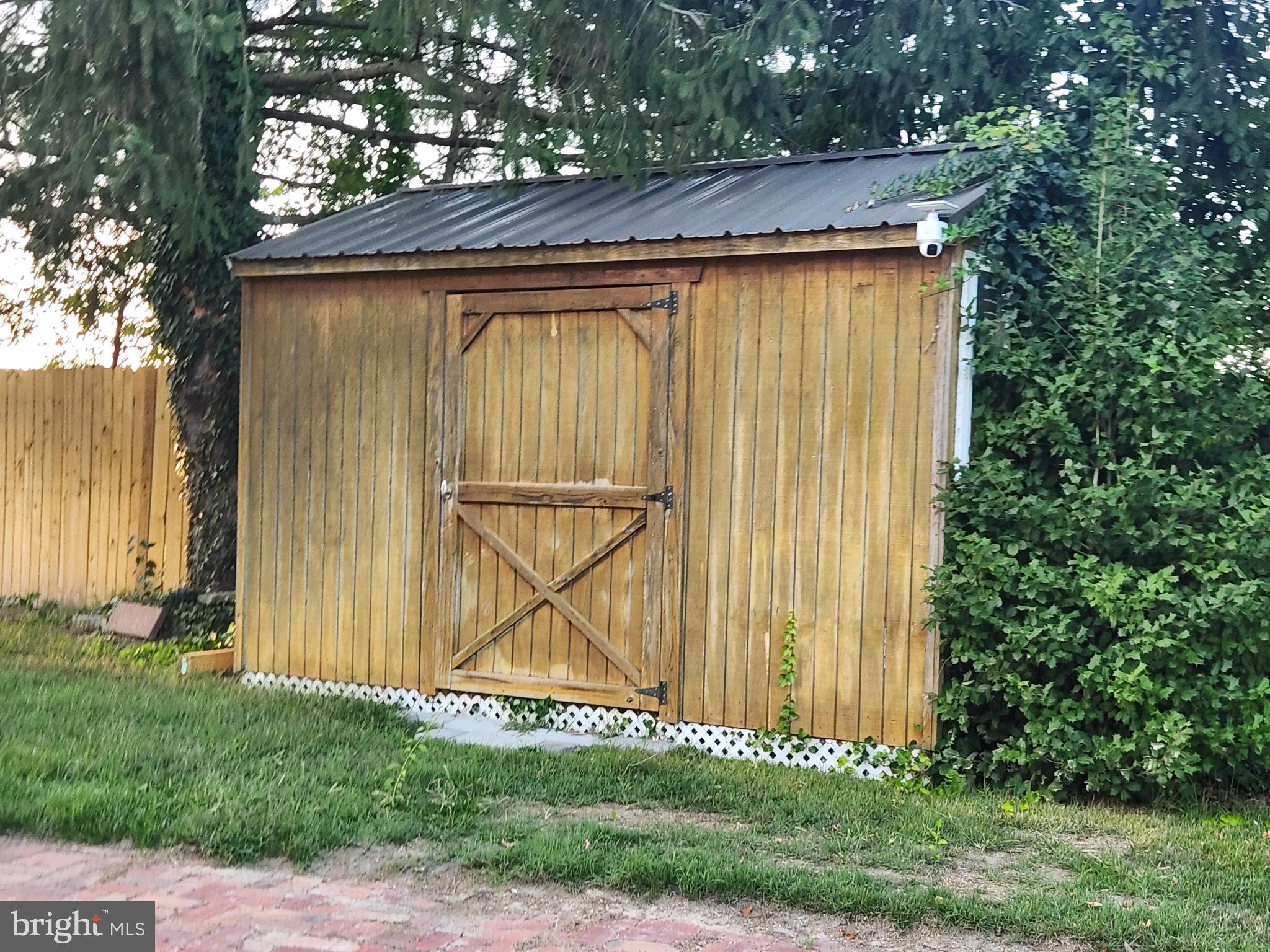 512 State Street Seaford, DE 19973 - Photo 29 of 32 a wooden door in front of a house