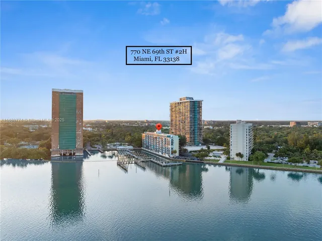 a view of a water with a large window