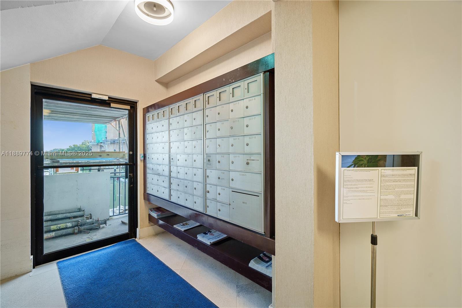 770 Northeast 69th Street, Unit 2H Miami, FL 33138 - Photo 29 of 39 a view of an empty room and wooden floor