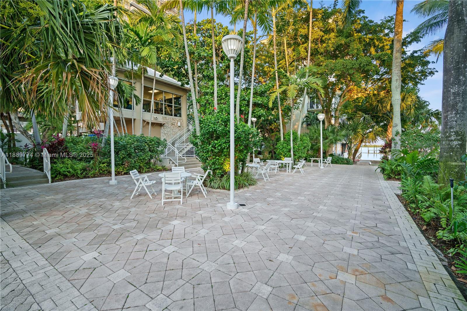 770 Northeast 69th Street, Unit 2H Miami, FL 33138 - Photo 30 of 39 a view of a bench in a backyard of house