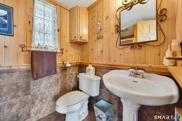 a bathroom with a sink and toilet