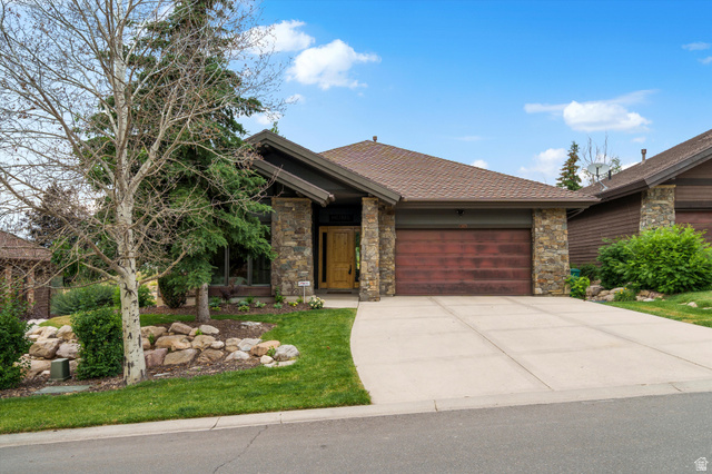 4892 Eagle Rdg Drive Eden, UT 84310 - Photo 31 of 39 Contemporary single-story residence with a multi-gabled roofline and stone-clad columns