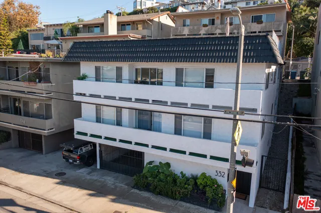 a front view of a house with street