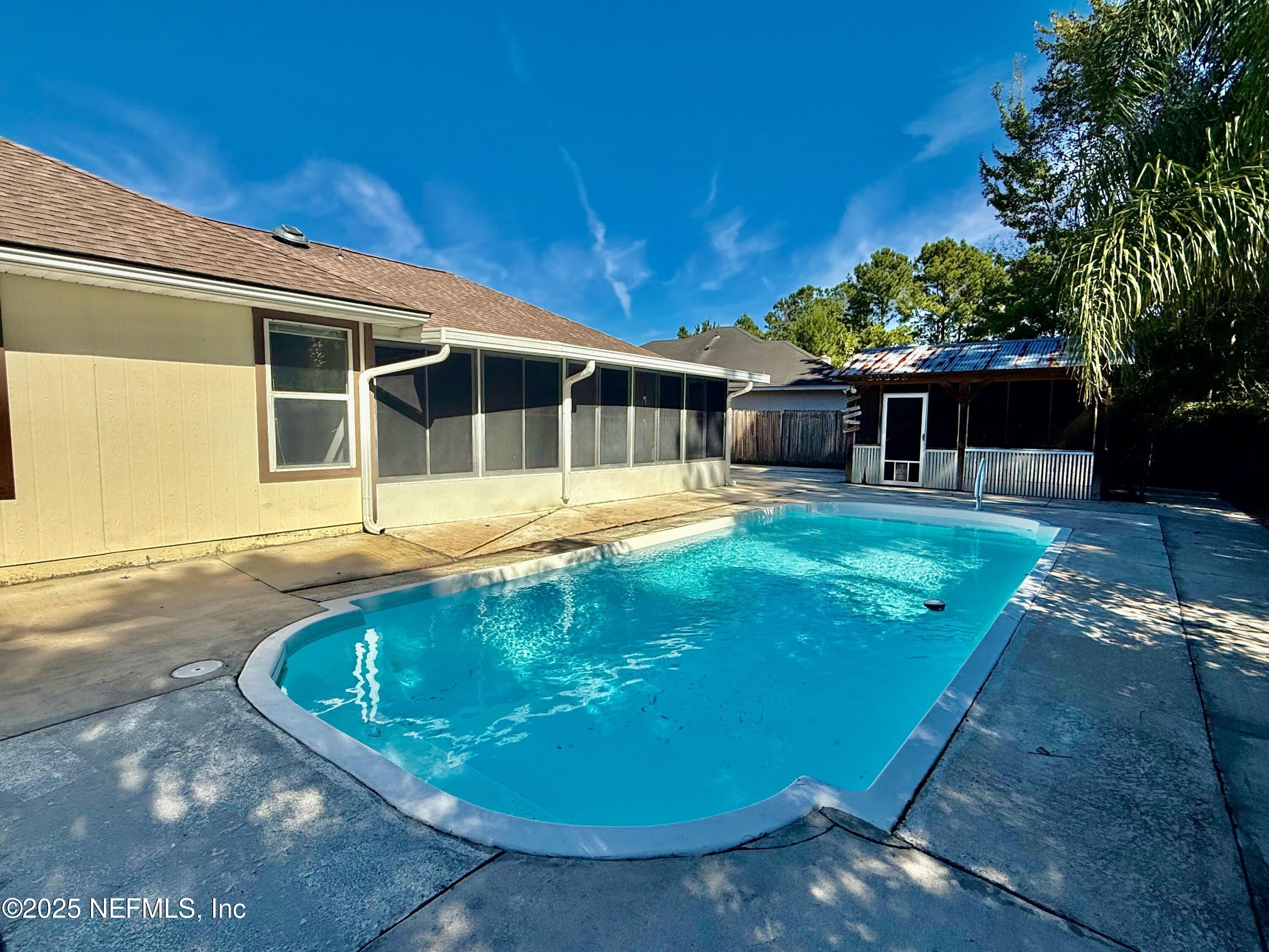 2007 Eclipse Drive Middleburg, FL 32068 - Photo 2 of 3 a view of a house with swimming pool