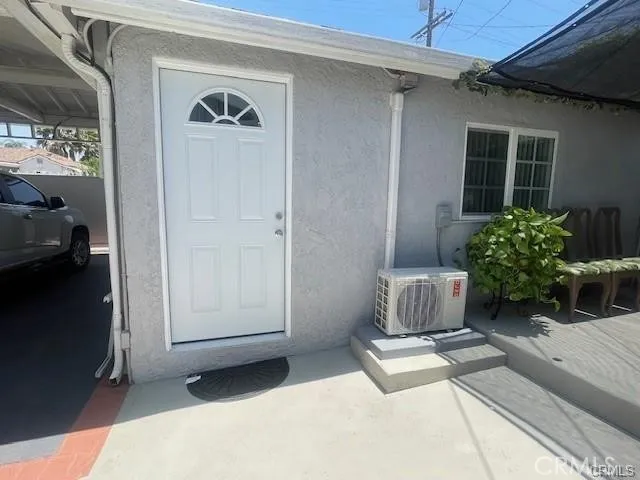 a view of entryway with living area