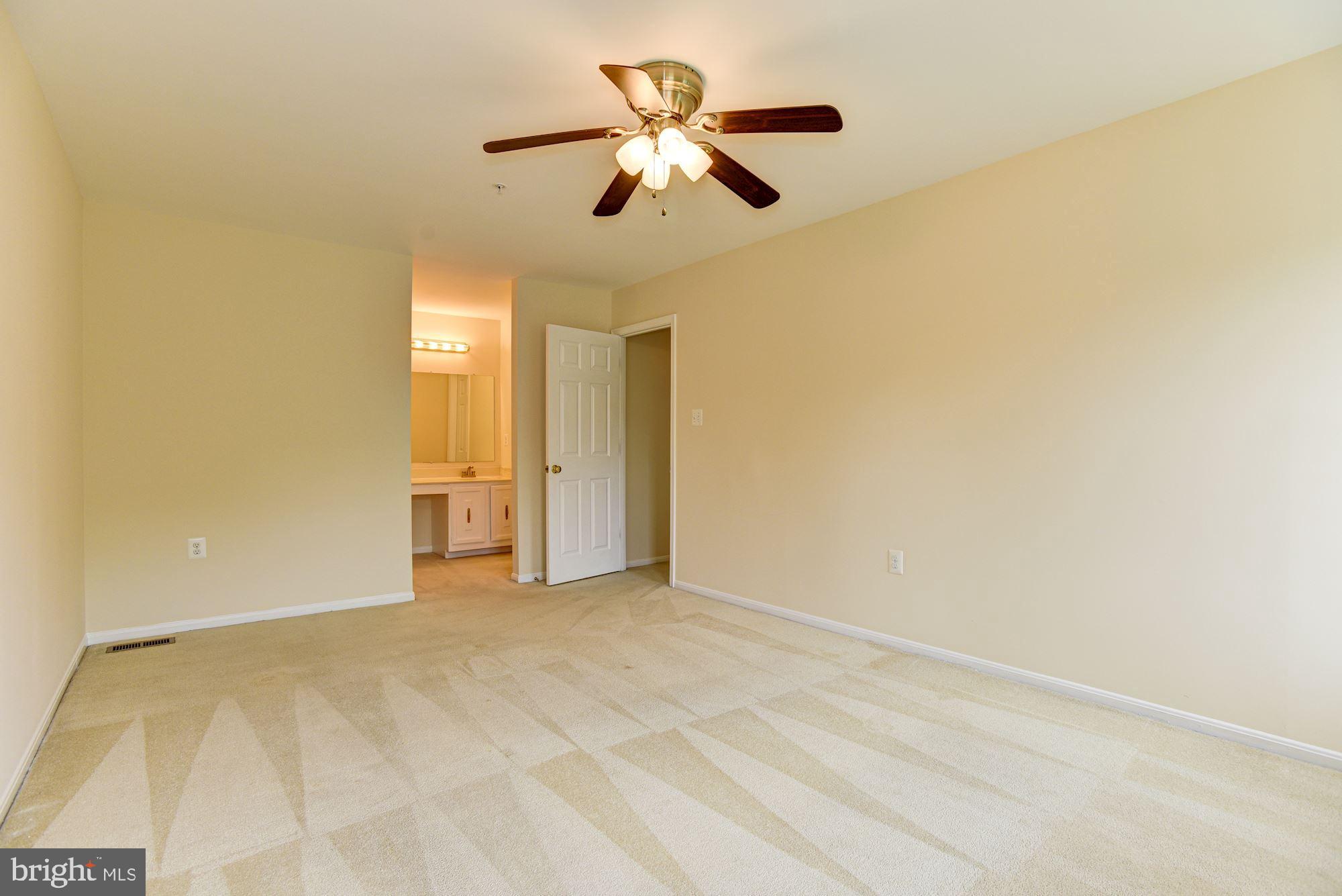13001 North Point Lane Laurel, MD 20708 - Photo 18 of 39 Primary Bedroom Suite