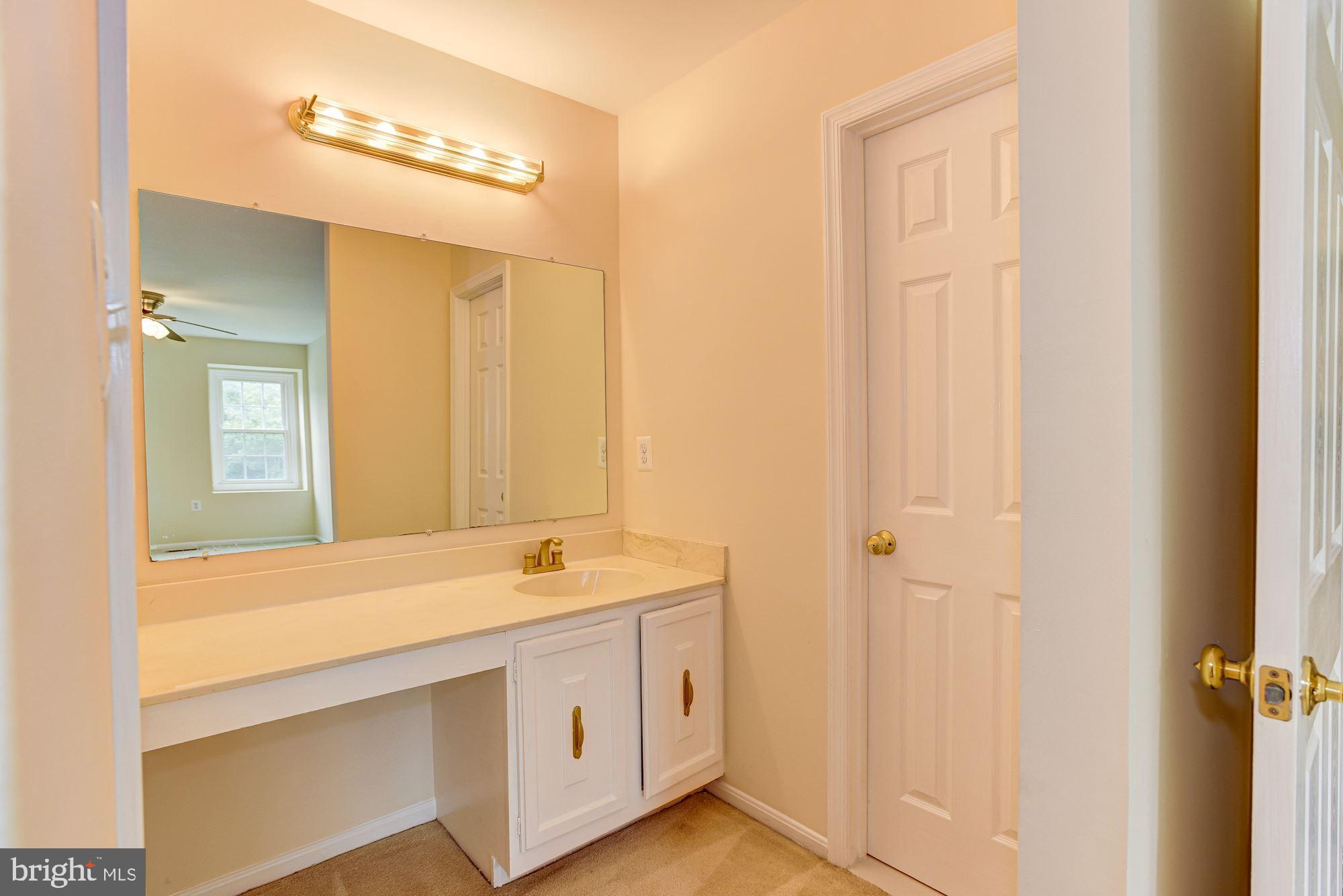 13001 North Point Lane Laurel, MD 20708 - Photo 19 of 39 Primary Bedroom Suite Dressing Area
