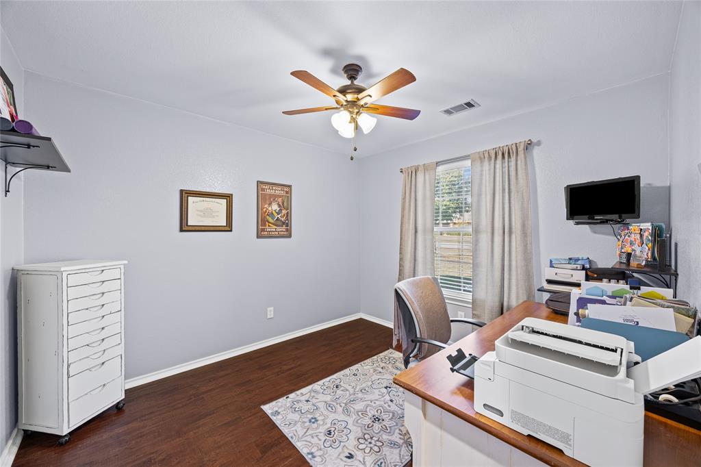 112 Springfield Lane Red Oak, TX 75165 - Photo 26 of 40 a view of a workspace with furniture and a window