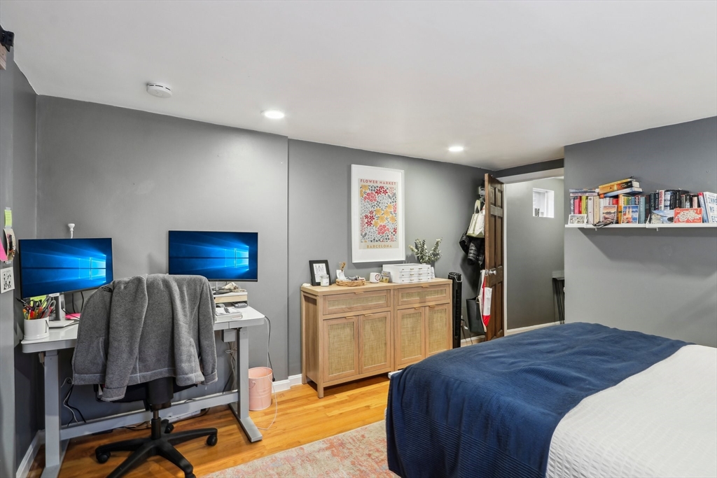 431 Shawmut Avenue, Unit 2 Boston, MA 02118 - Photo 15 of 25 a bedroom with a bed and furniture