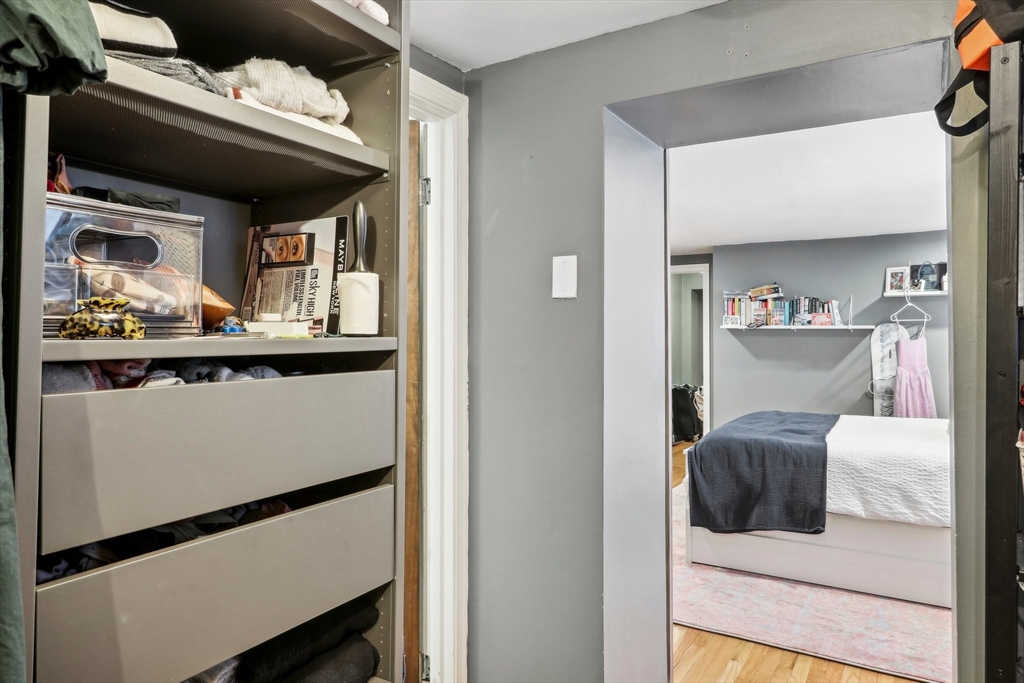 431 Shawmut Avenue, Unit 2 Boston, MA 02118 - Photo 18 of 25 a living room with a bed and furniture