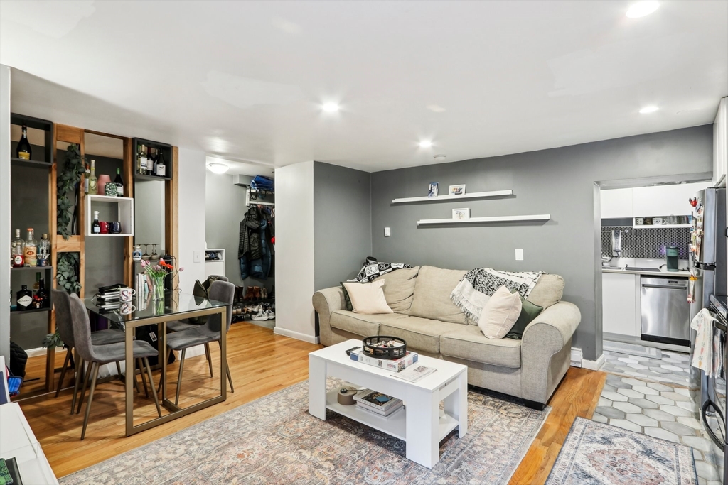 431 Shawmut Avenue, Unit 2 Boston, MA 02118 - Photo 9 of 25 a living room with furniture and view of kitchen