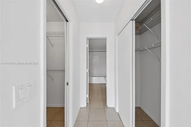 a view of a room with racks on the wall