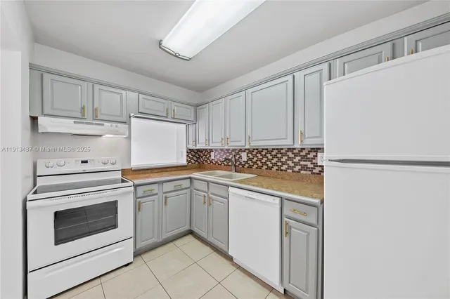 a view of a street with cars