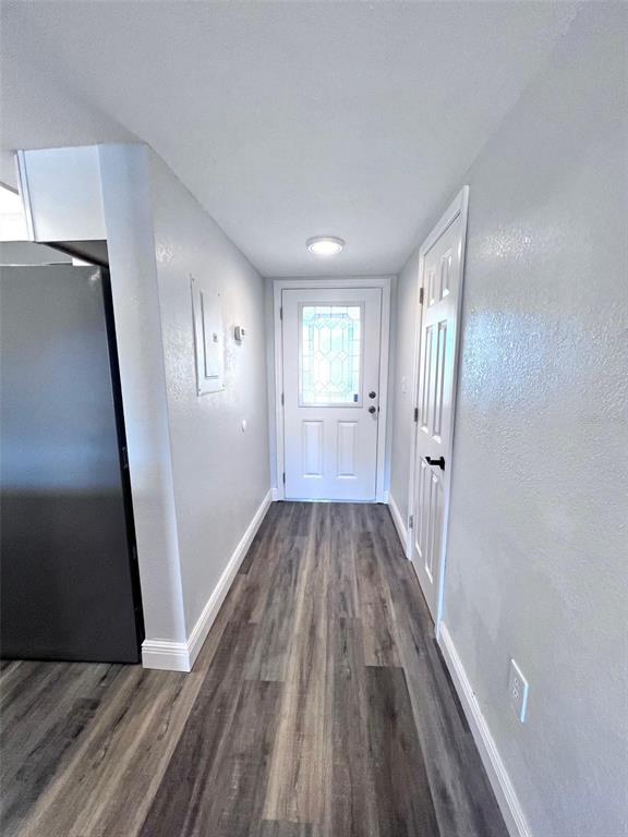 8210 Aquila Street, Unit 227 Port Richey, FL 34668 - Photo 14 of 68 a view of a room with wooden floor and staircase