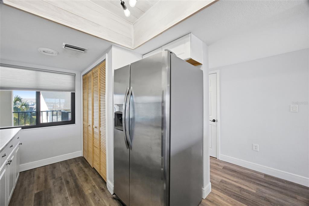 8210 Aquila Street, Unit 227 Port Richey, FL 34668 - Photo 17 of 68 a bathroom with a glass shower door and a sink