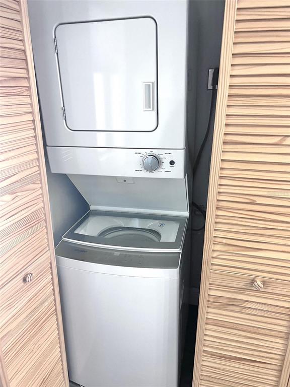 8210 Aquila Street, Unit 227 Port Richey, FL 34668 - Photo 19 of 68 a close view of washer and dryer