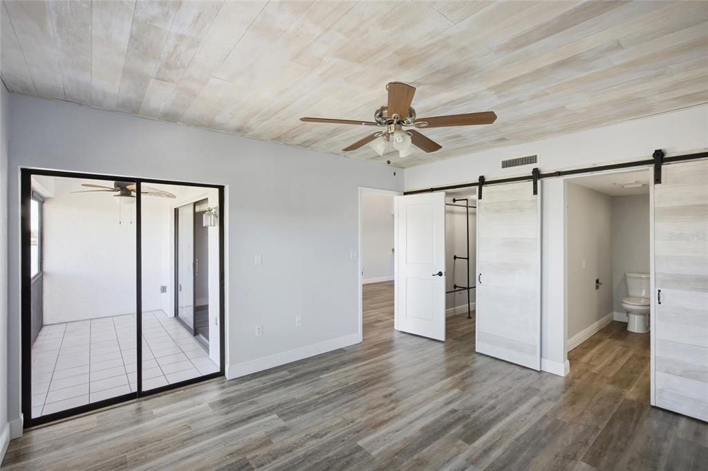 8210 Aquila Street, Unit 227 Port Richey, FL 34668 - Photo 29 of 68 a view of entryway with wooden floor