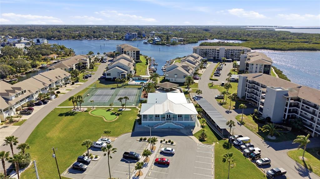 8210 Aquila Street, Unit 227 Port Richey, FL 34668 - Photo 48 of 68 an aerial view of a houses with outdoor space